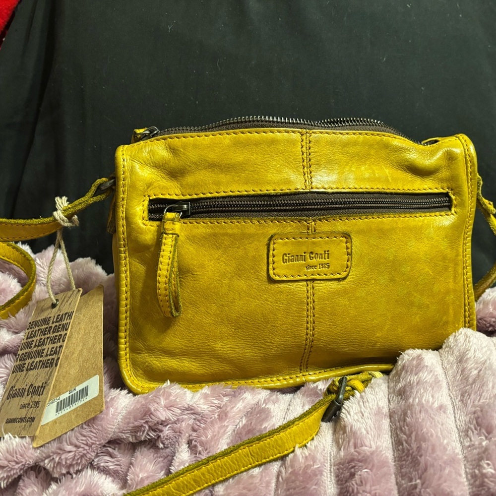 Gianni conti
Small genuine sun leather